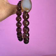 INCANTEVOLE -  Chocker flessibile contrarié  topazio fumé (cm1,2) sfaccettato con terminali ovali lunghi agata