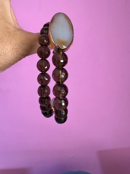 INCANTEVOLE -  Chocker flessibile contrarié  topazio fumé (cm1,2) sfaccettato con terminali ovali lunghi agata