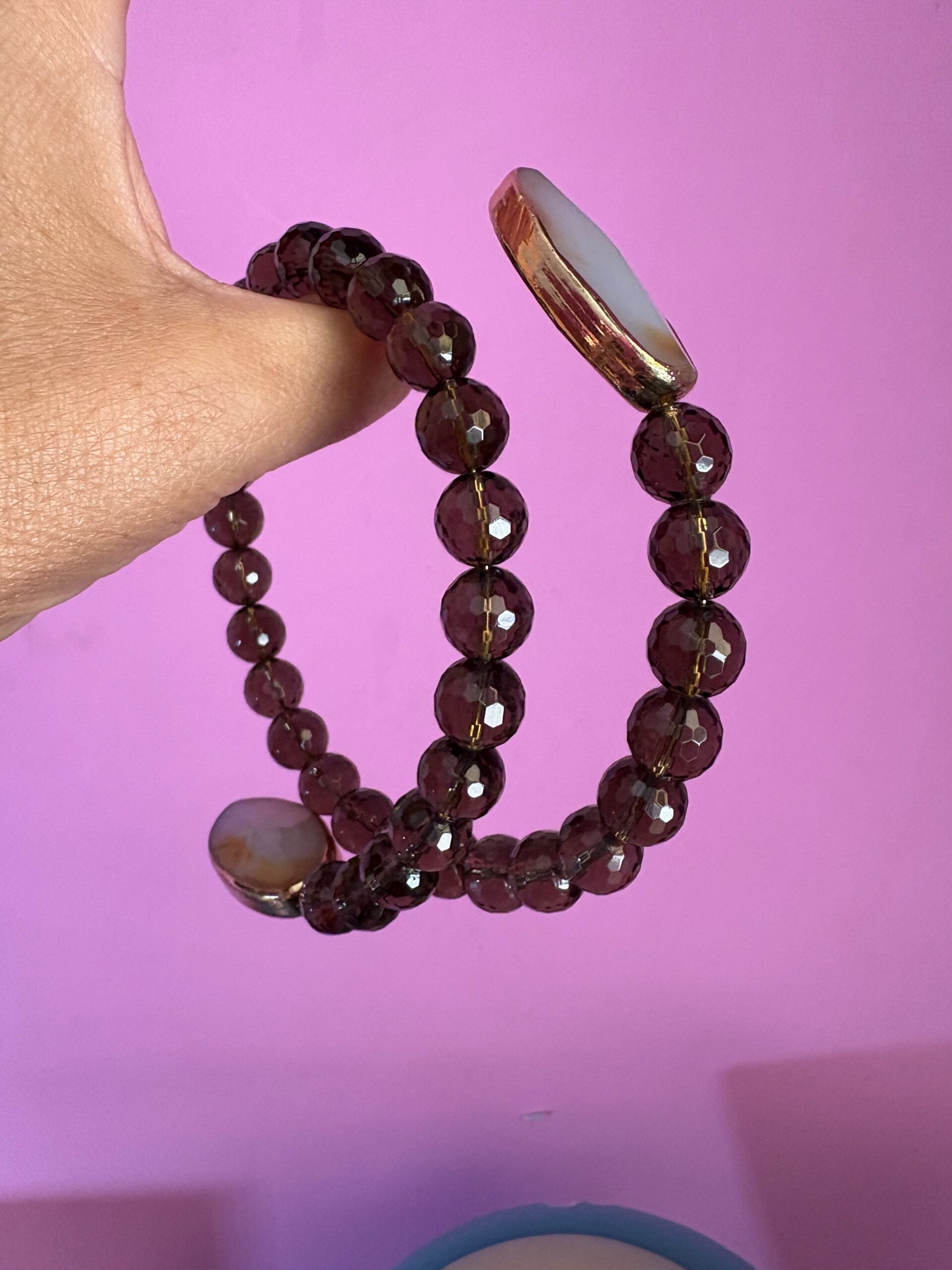 INCANTEVOLE -  Chocker flessibile contrarié  topazio fumé (cm1,2) sfaccettato con terminali ovali lunghi agata
