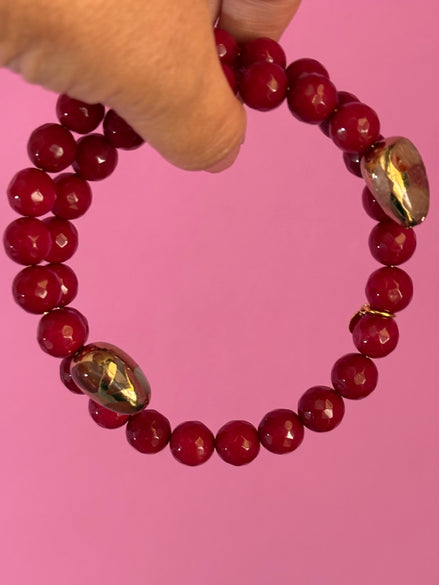 INCANTEVOLE -  Chocker flessibile contrarié  giada ruby sfaccettata con  terminali dorati Agata