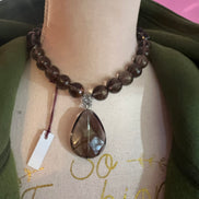 Collana con topazio fumè e pendente