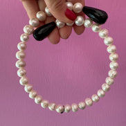 INCANTEVOLE -  Chocker  contrarié perle coltivate  con 2 gocce onice