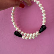 INCANTEVOLE -  Chocker  contrarié perle coltivate  con 2 gocce onice