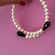 INCANTEVOLE -  Chocker  contrarié perle coltivate  con 2 gocce onice