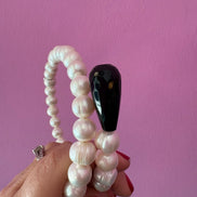 INCANTEVOLE -  Chocker  contrarié perle coltivate  con 2 gocce onice