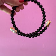 INCANTEVOLE -  Chocker flessibile contrarié  onice con terminali inserti dorati