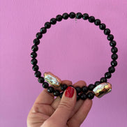 INCANTEVOLE -  Chocker flessibile contrarié  onice con terminali inserti dorati