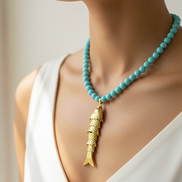 Collana POISSONS - turchese mm 6 - chiusura argento 925 -  pesciolino gold