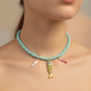 Collana POISSONS - turchese mm 4 - chiusura argento 925 -  pesciolini