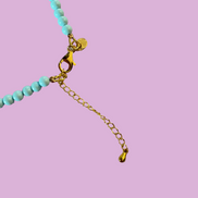 Collana POISSONS - turchese mm 4 - chiusura argento 925 -  pesciolini