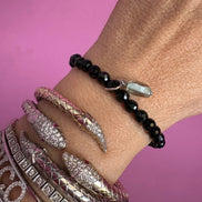 BISETTE - Bracciale sfere onice cm0,6 e charm topazio azzurro
