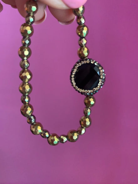 Braccialetto  Bisette ematite oro con onice
