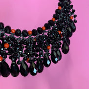 INCANTEVOLE -   MEDITERRANEA Chocker flessibile onic con cascata cristalli neri swarovski e corallo
