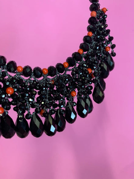 INCANTEVOLE -   MEDITERRANEA Chocker flessibile onic con cascata cristalli neri swarovski e corallo