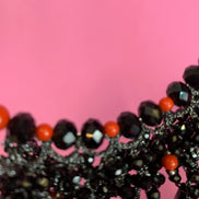 INCANTEVOLE -   MEDITERRANEA Chocker flessibile onic con cascata cristalli neri swarovski e corallo
