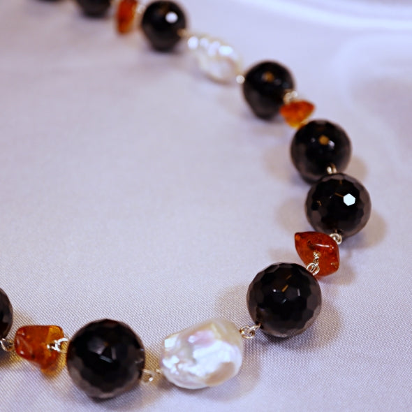 Collana di onice con perle e ambra