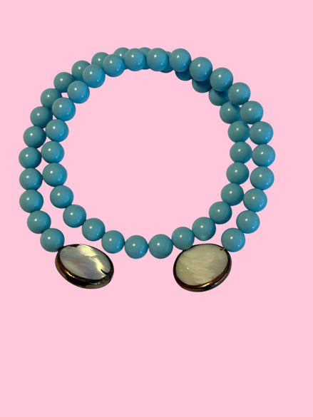 INCANTEVOLE -  OCEANO Chocker flessibile contrarié  turchese  0,8 con terminali madreperla