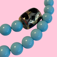 INCANTEVOLE -  OCEANO Chocker flessibile turchese contrarié con terminali lapislazzuli