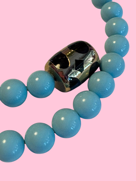 INCANTEVOLE -  OCEANO Chocker flessibile turchese contrarié con terminali lapislazzuli