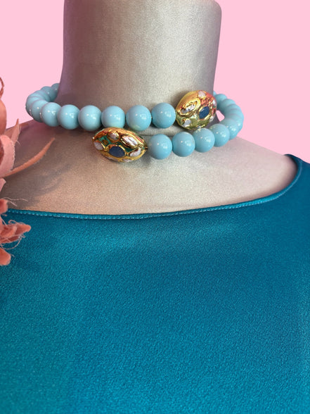 INCANTEVOLE -  OCEANO Chocker flessibile turchese 1.2 contrarié con terminali gold