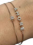 Bracciale rigido oro 18 kt con diamanti con iniziale personalizzabile