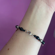 NODINI - Bracciale con onice, cuore e charms