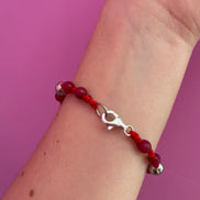 NODINI - Bracciale con giada rossa e elefante