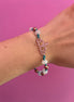 NODINI - Bracciale con cordino azzurro e corona