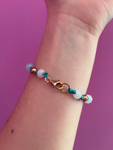 NODINI - Bracciale con cordino azzurro e corona