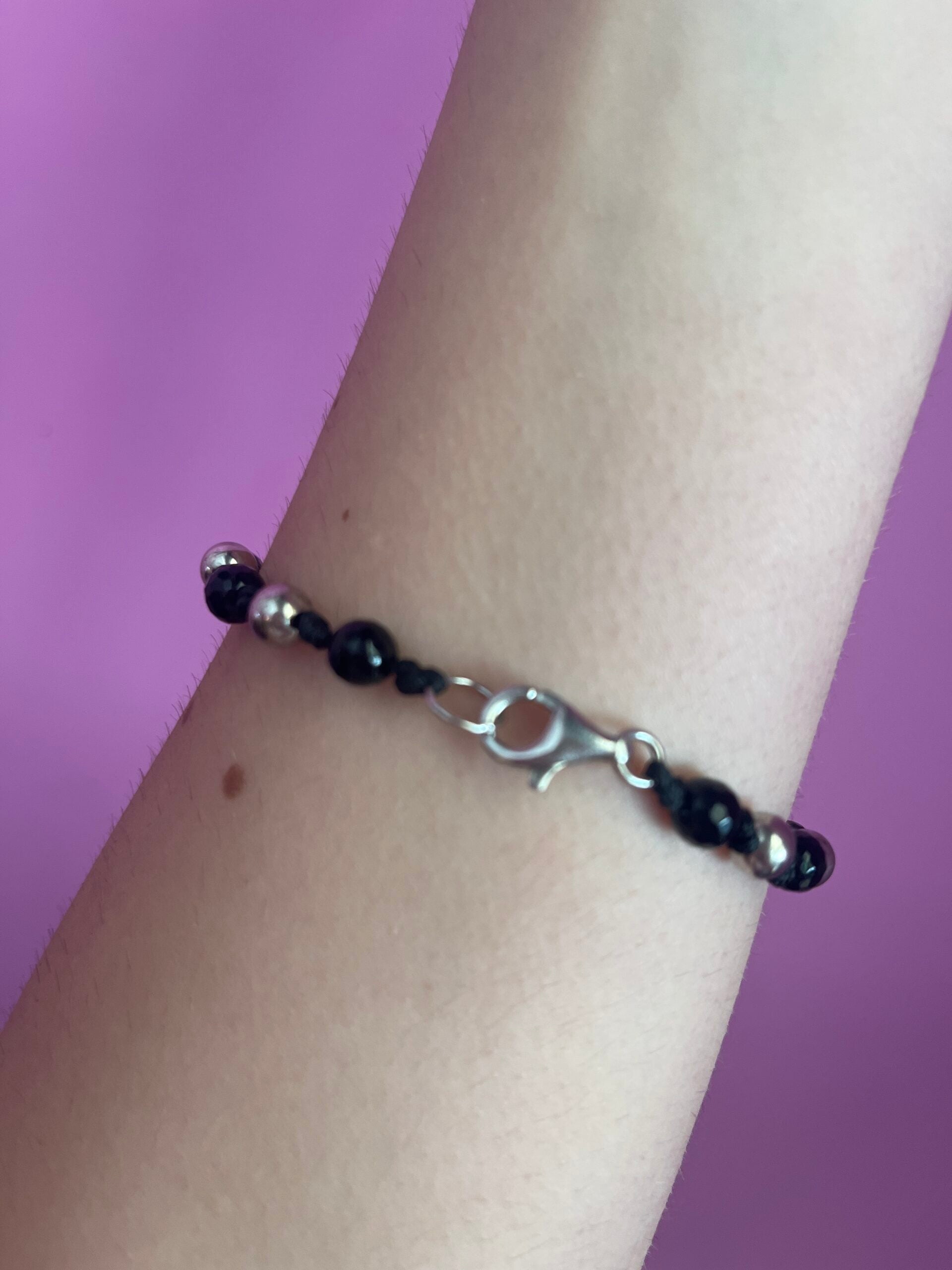 NODINI - Bracciale con onice e quadrifoglio