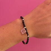 NODINI - Bracciale con onice e quadrifoglio con zirconi