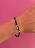 NODINI - Bracciale con onice e quadrifoglio con zirconi