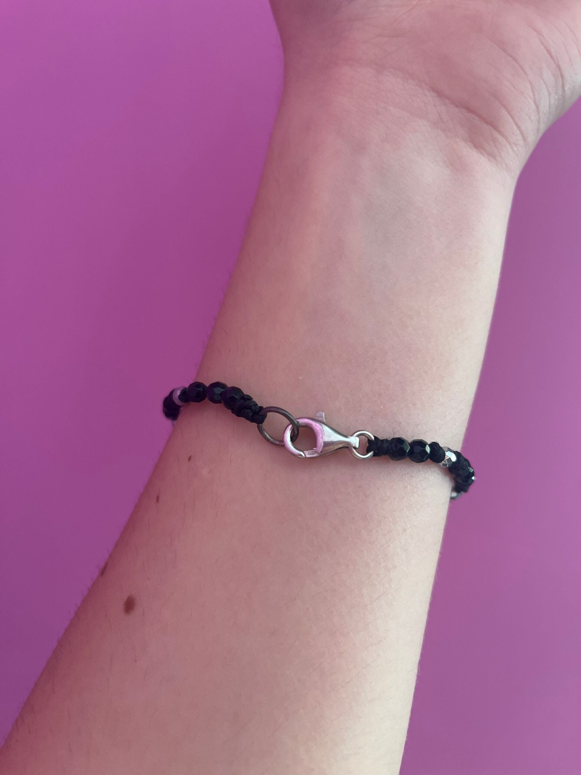 NODINI - Bracciale con onice e quadrifoglio con zirconi