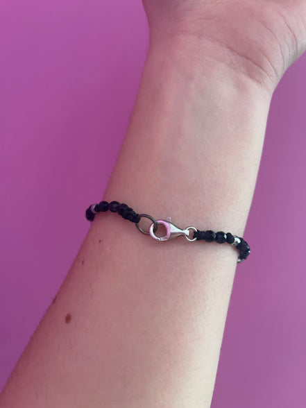 NODINI - Bracciale con onice e quadrifoglio con zirconi