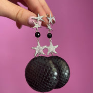 Orecchini pitone naturale nero e stelle con zirconi