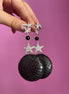 Orecchini pitone naturale nero e stelle con zirconi