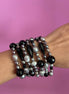 MAGNIFICO Bracciale multifili - 7 file - onice e perle coltivate grigie